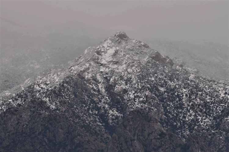 snow[capped mtn peak